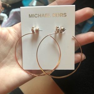 Unworn Michael Kors gold hoop earrings